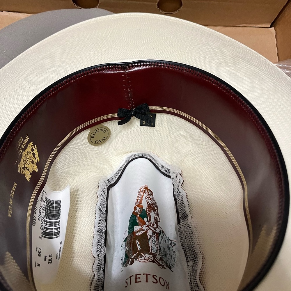 Stetson Cowboy hat. Size 7/8. Red ostrich band.